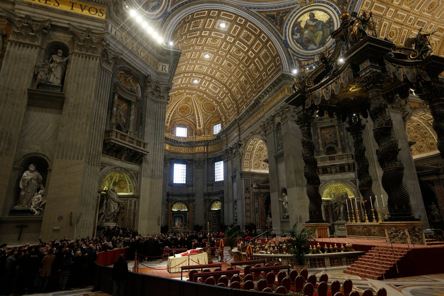 The body of Pope Benedict XVI lies in St. Peter’s Basilica for people to pay their respects at the Vatican Jan. 2, 2023.